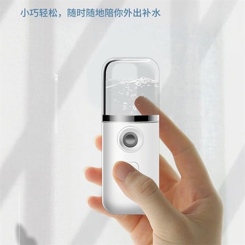 Handheld mini humidifier/smoke device/beauty instrument for moisturizing and skin rejuvenation, USB rechargeable, cross-border in-stock manufacturer.