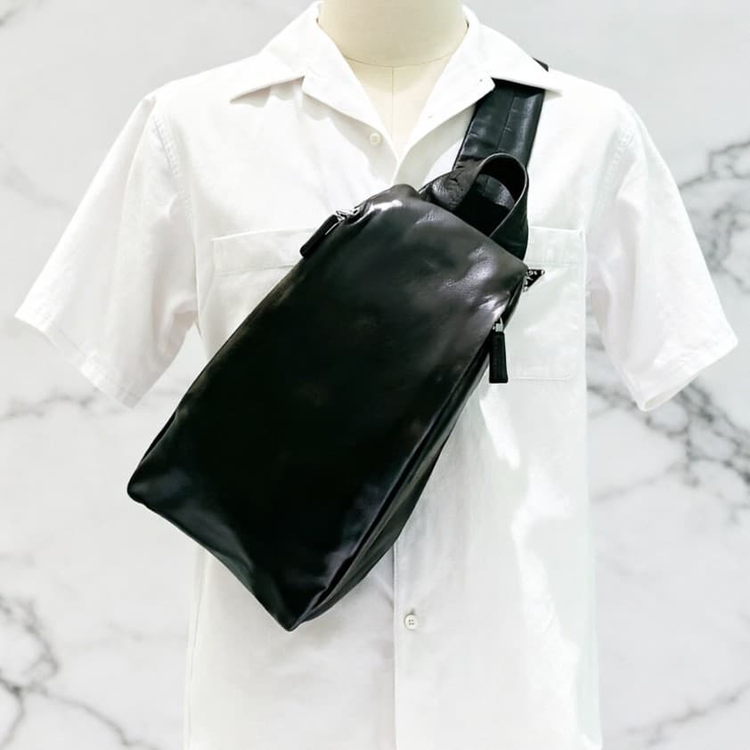 Cross-border genuine leather chest bag P family unisex backpack backpack travel bag retro sports commuter bag crossbody