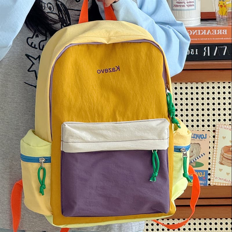 Wholesale new travel casual lightweight backpack large capacity contrasting color ultra-light student school bag simple niche backpack