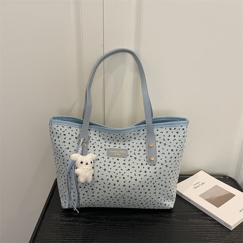 Commuting and shopping, fresh and trendy, lazy style, casual women's simple 2026 printed large-capacity pendant shoulder tote bag