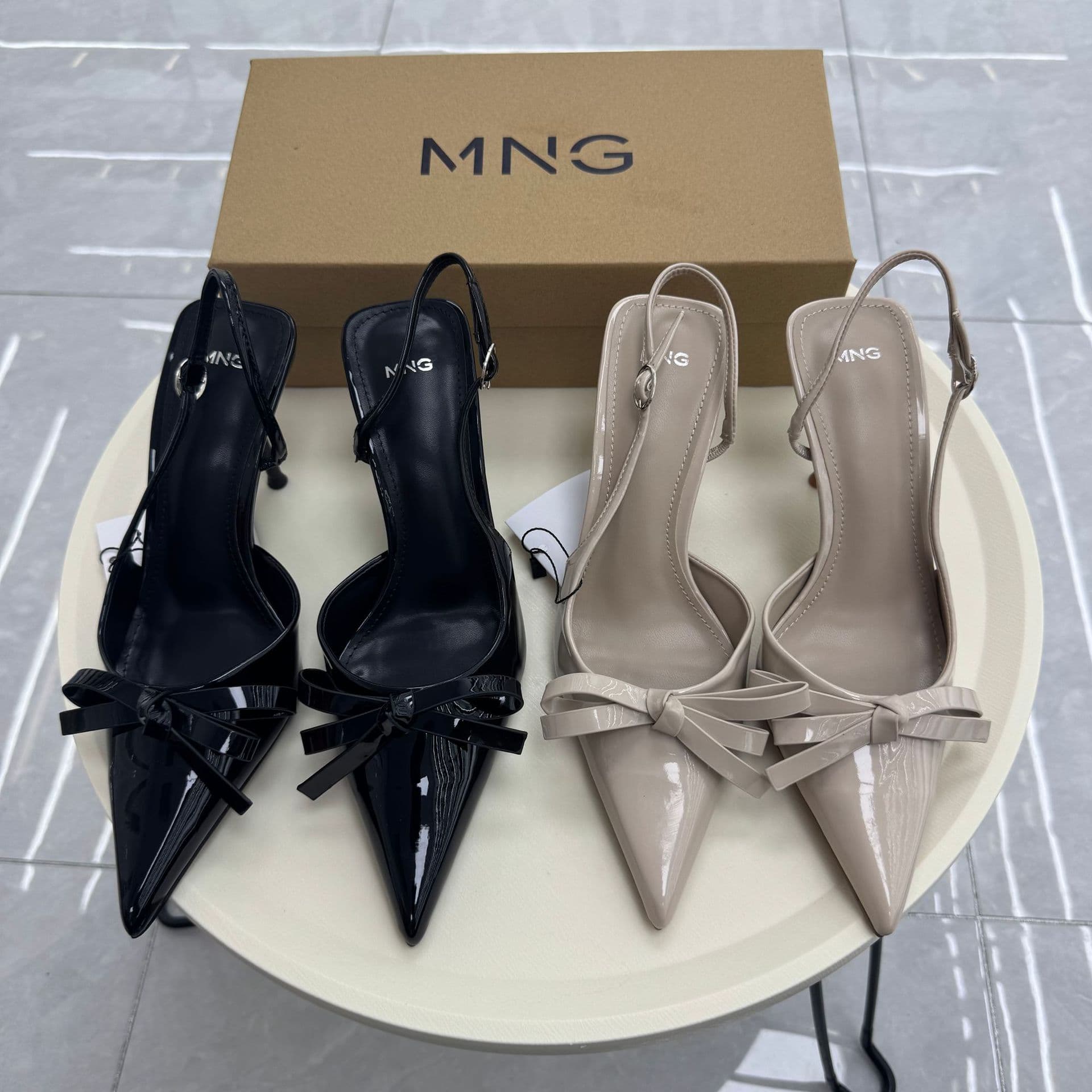 Spanish Mango 2026 summer new product pointed toe gentle nude bow side hollow patent leather toe high-heeled sandals