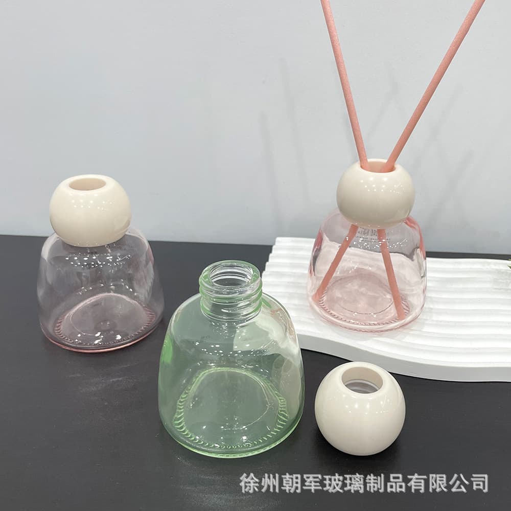 Wholesale factory direct stock 100ml small apple-shaped transparent glass bottle for reed diffuser, aroma diffuser bottle, perfume bottle