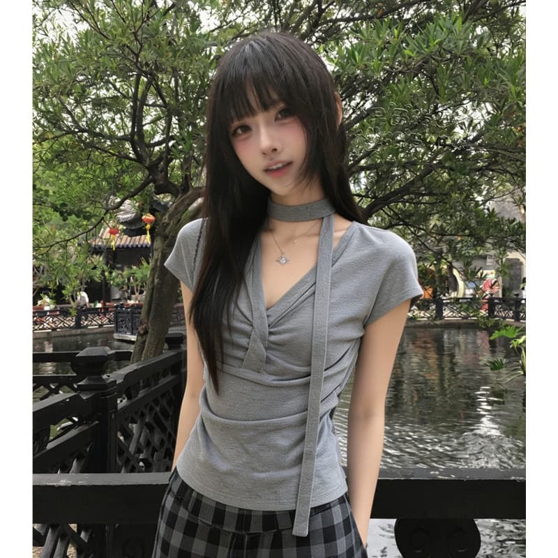 Korean-style elegant twisted V-neck small flutter sleeve T-shirt women's summer new waist-cinching slim top wholesale