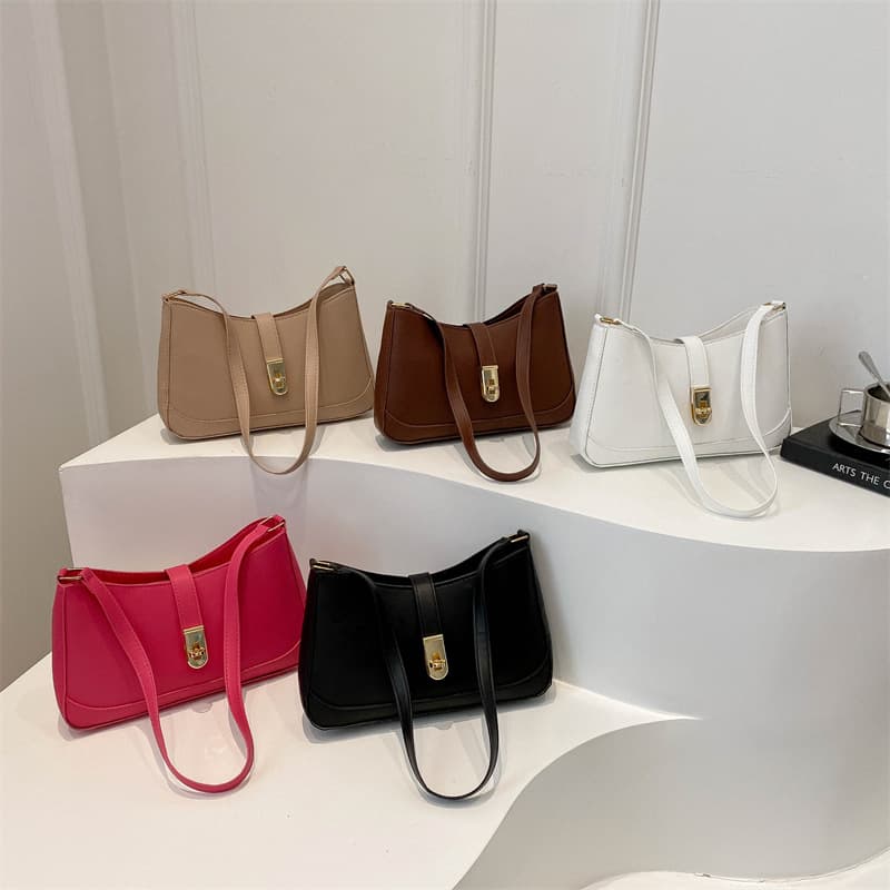 This year's popular niche design shoulder bag 2024 new trendy solid color crossbody bag fashionable style lock armpit bag