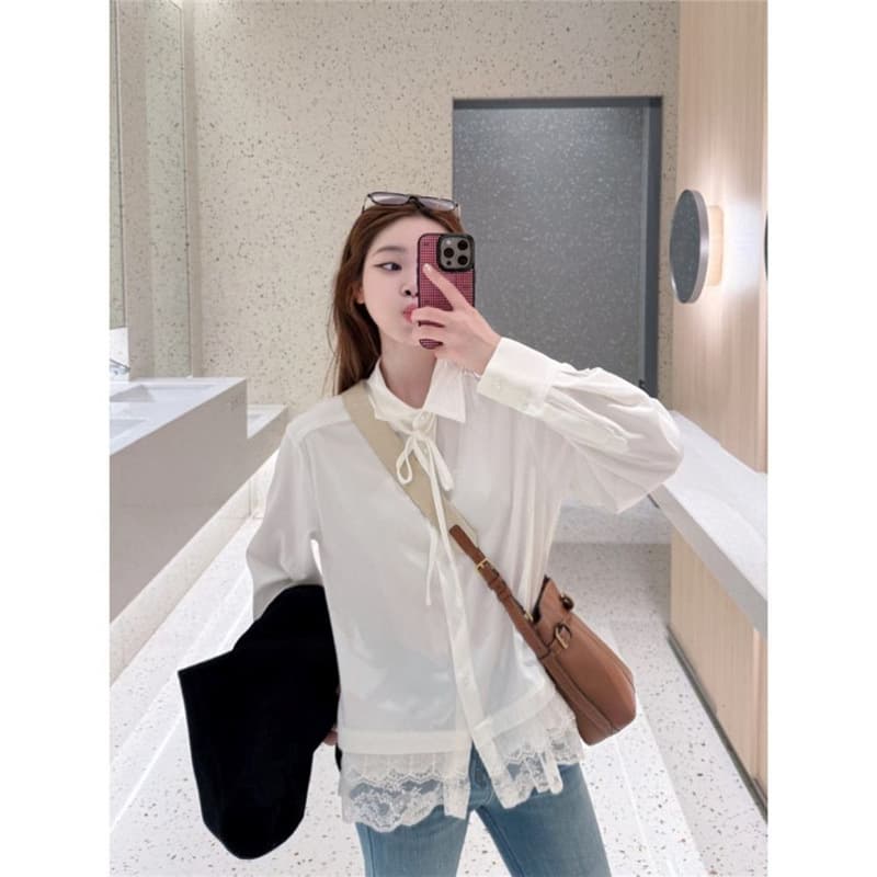 Korean age-reducing white shirt women's autumn 2026 new small shirt French top lace loose chic shirt