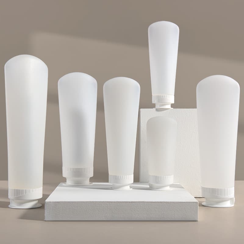 Travel Size Cosmetic Plastic Bottles with Flip Top And Squeeze Tube Empty Containers for Filling Customizable Packaging