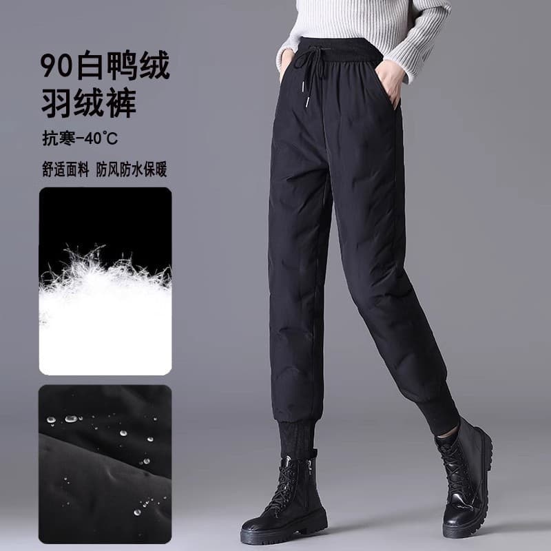 High-quality down pants for women, fashionable high-waisted, new winter style for 2025, fleece-lined, warm, tapered, casual workwear cotton pants.