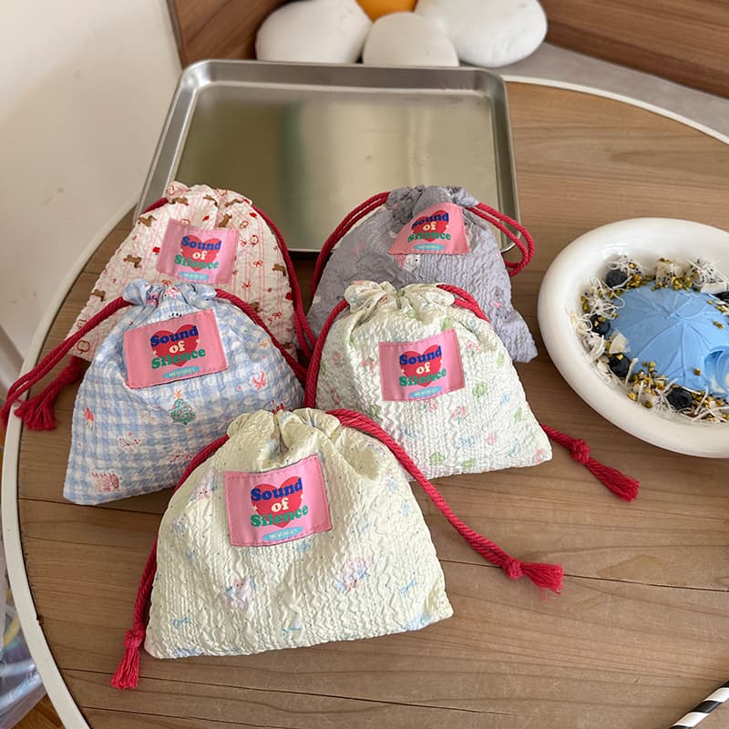 Cute cartoon drawstring foam storage bag, portable fashionable outing sundries cosmetic bag