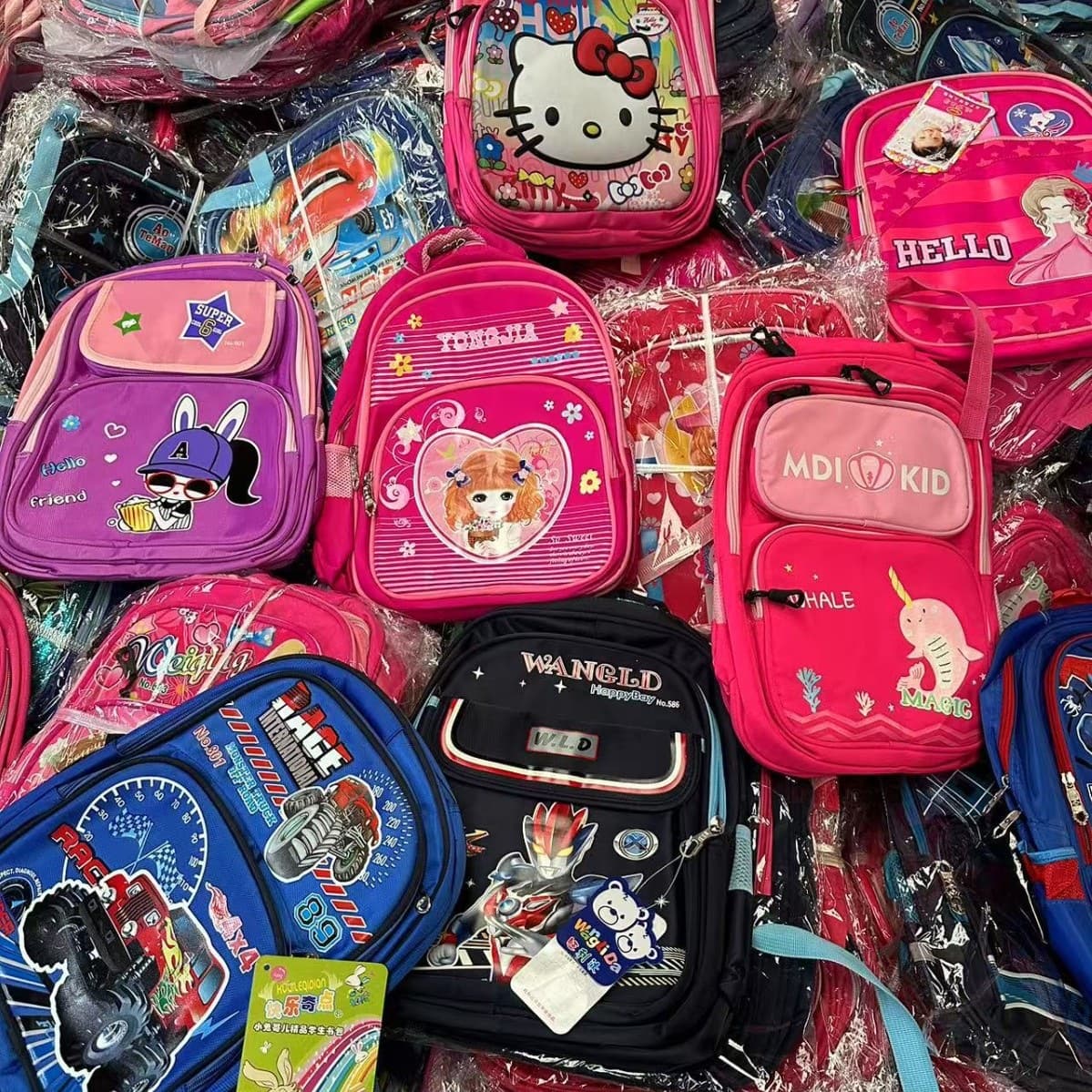 Backpack: Primary school boys and girls reduce burden, new spine-protecting waterproof large-capacity children's backpack for grades 1, 2, 3, 4