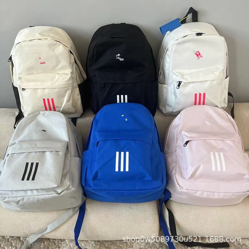 Campus men's and women's middle and high school backpacks large-capacity school bags travel student sports backpacks trendy brand Dijia casual bags