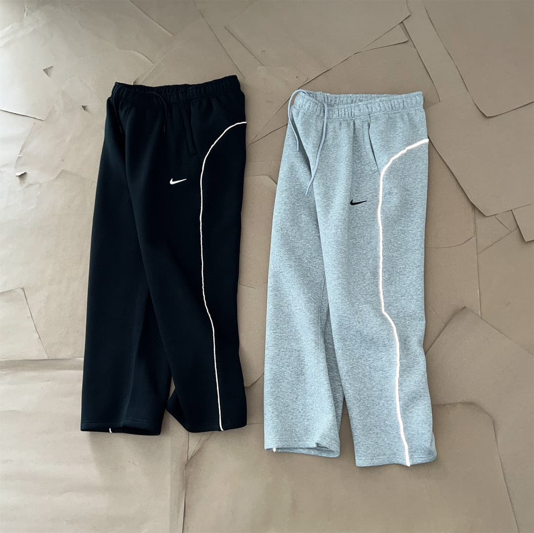NOCTA collaboration series dental floss 3M reflective strip Logo printed sport composite fleece-lined long pants straight-leg pants