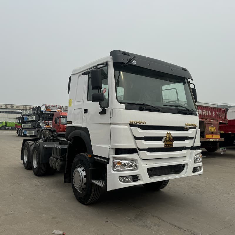 Rear 8-wheel Howo tractor head for sale, dual-drive freight truck head, 375HP container transport tractor