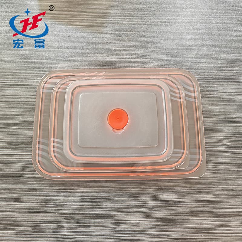 Our factory specializes in producing square food storage containers with sealed PP plastic lids and silicone rings to prevent spills. Sizes include small, medium, and large.