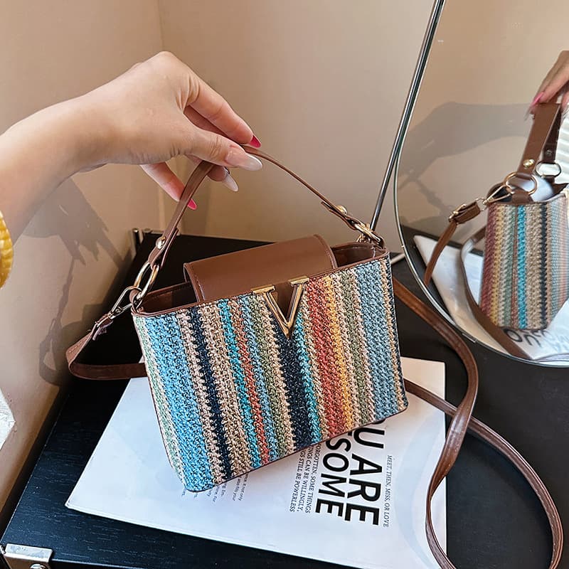 Internet celebrity fashion rainbow woven bag for women 2026 summer new clutch bag coin purse small fresh and western style women's bag