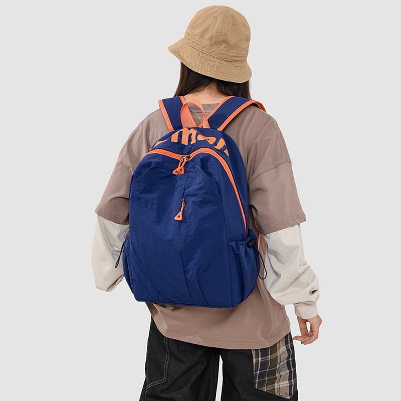 Niche lightweight water-repellent schoolbag female middle school and high school students large-capacity sports backpack outdoor travel commuter backpack