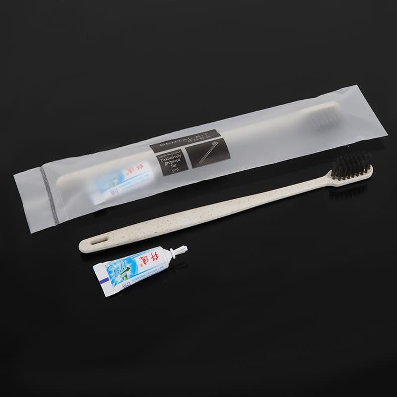 Hotel-specific guesthouse toiletries set with disposable soft-bristle toothbrush and toothpaste for B&B wholesale