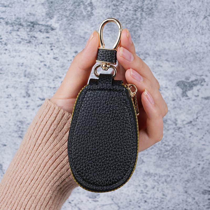 Mini key bag for men and women, PU leather zipper storage bag, car keychain protective cover, portable simple pendant bag
