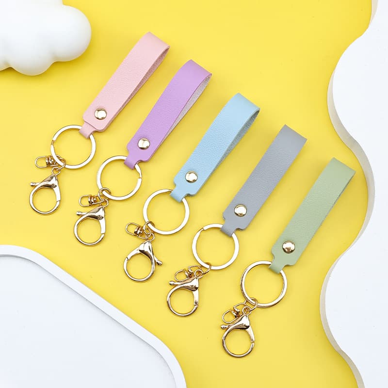 Solid color leather keychain business gift keychain diy lobster buckle bag pendant creative car keychain