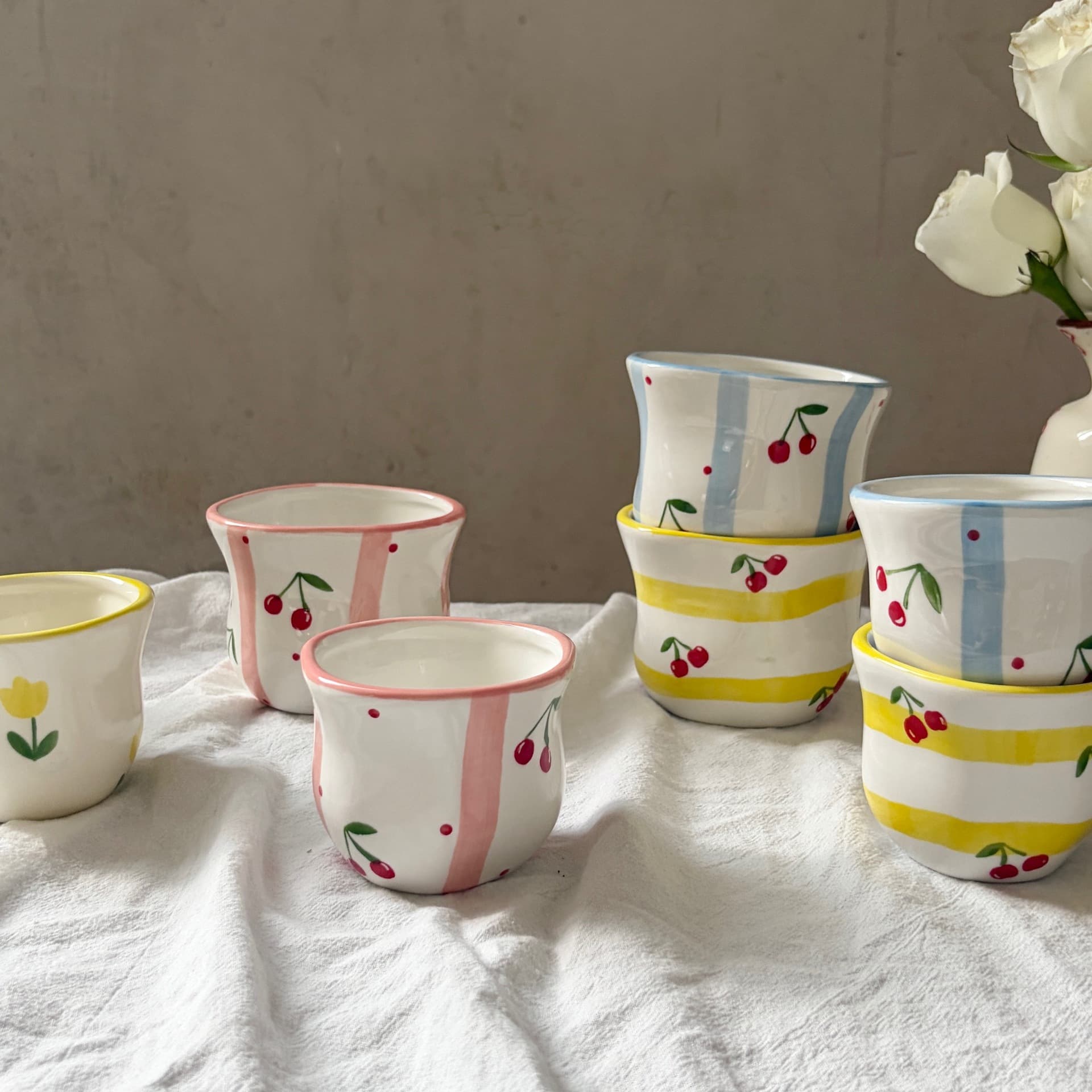 Ins style hand-painted hand-kneaded irregular ceramic coffee hand cup colorful striped cherry couple cup drop shipping
