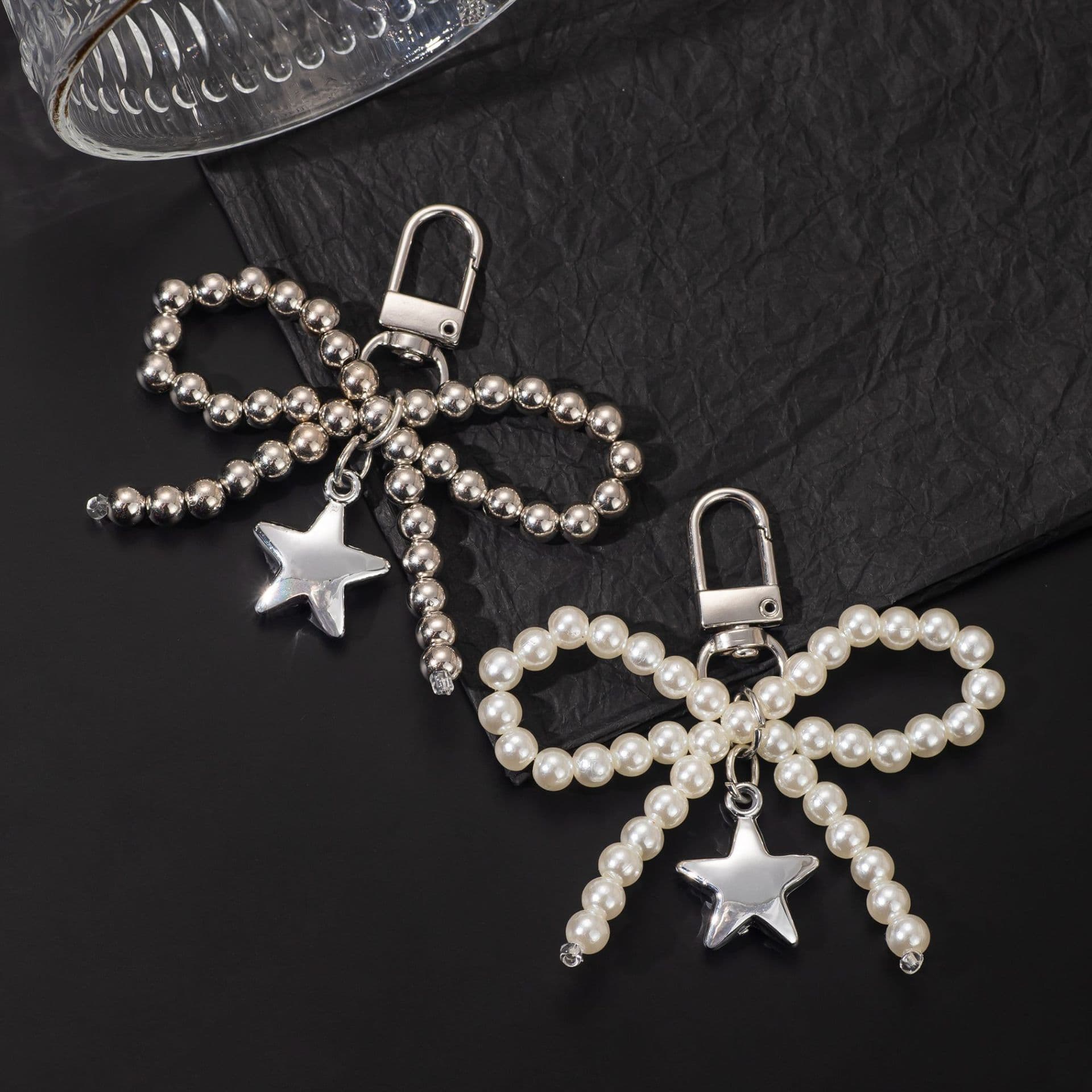 Cross-border Korean version of Dongdaemun fashion imitation pearl star pendant bow keychain mobile phone pendant bag pendant