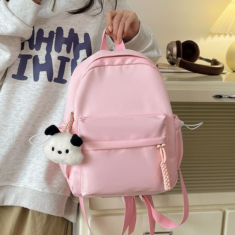 Japanese-style campus casual solid color backpack for women, simple and versatile lightweight bag for high school and college students