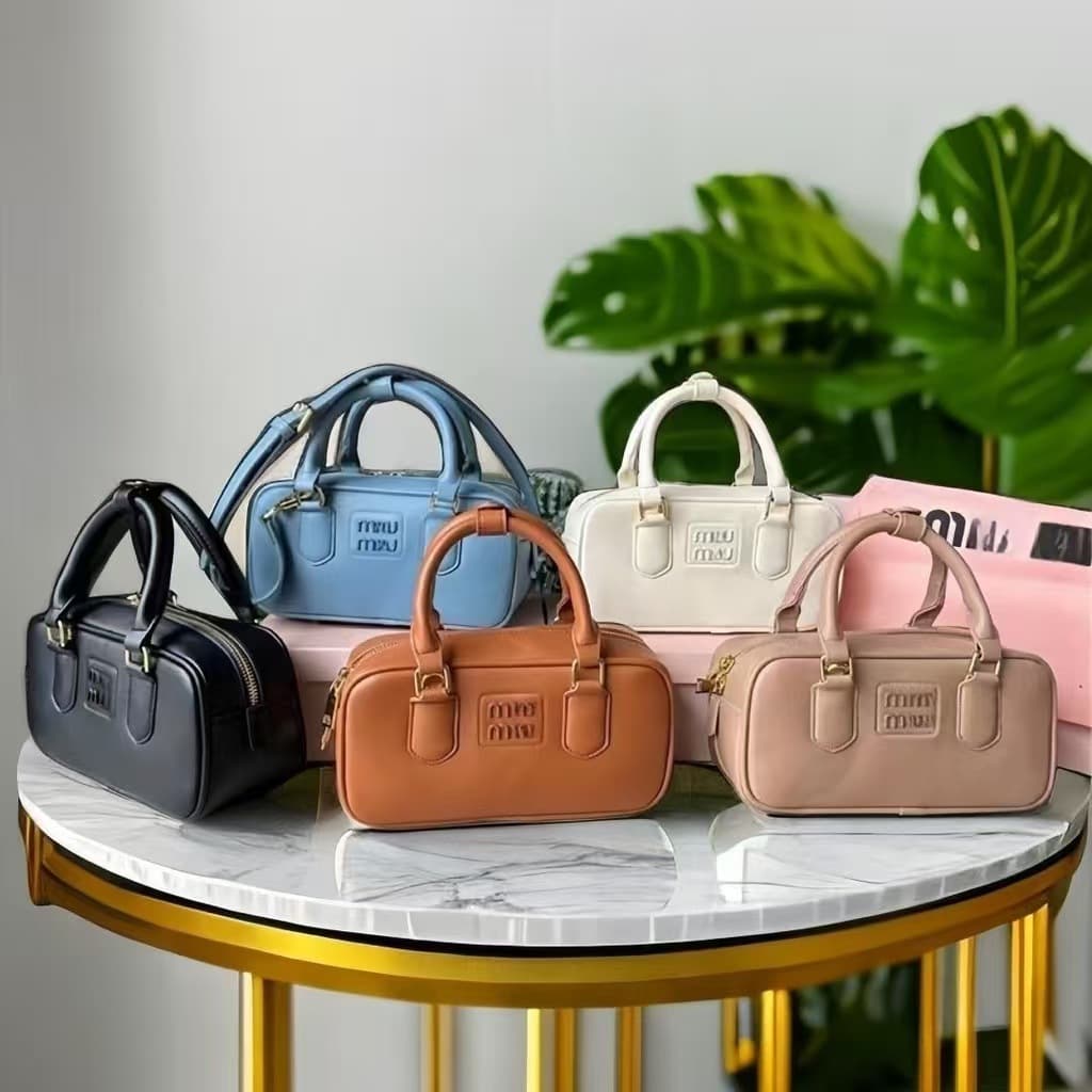 MIU 2025 New Boston Pillow Bag Fashionable Trendy Small Square Bag Handheld Shoulder Crossbody Bowling Bag