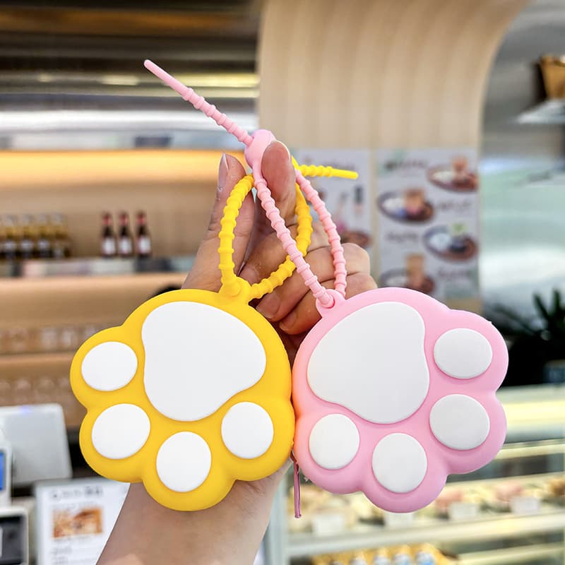 Hot-selling cute cat paw coin purse keychain mini lipstick earphone bag 2-in-1 personalized pendant gift wholesale