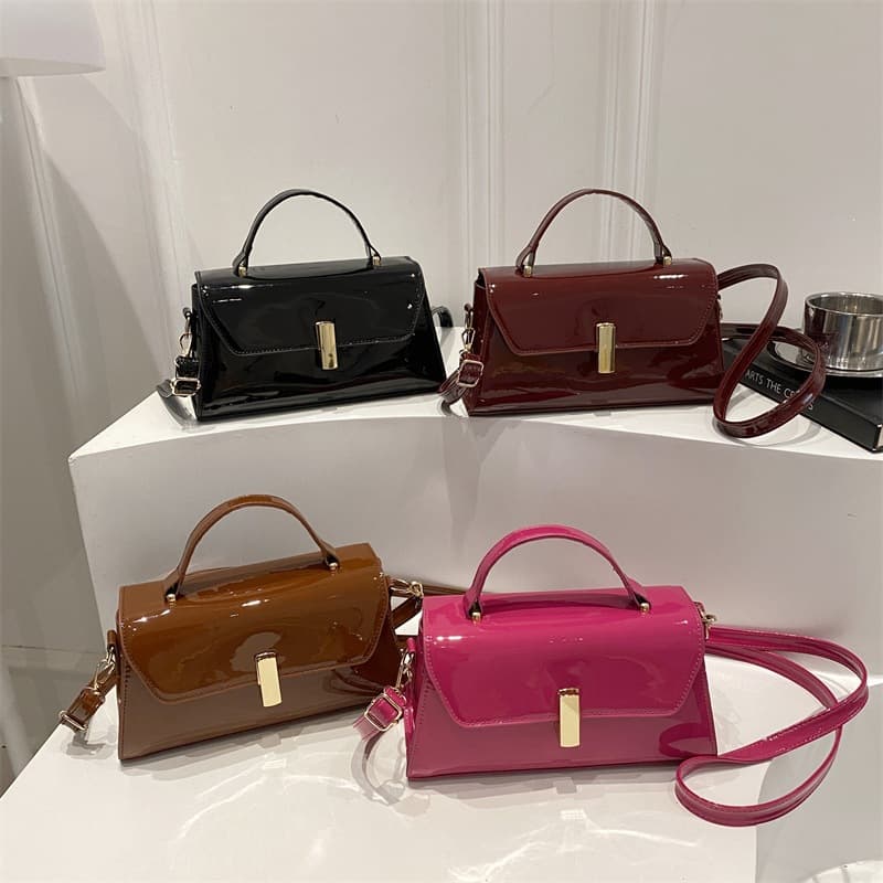 Hand-carrying baguette bag for women, Korean style textured glossy shoulder crossbody 2026 new trend fashion simple lock buckle casual