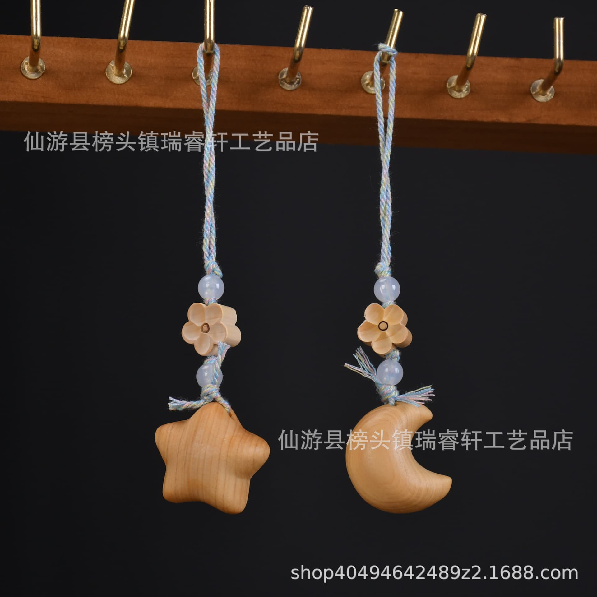 New Maillard-colored sandalwood with cypress accents, featuring stars, moons, and astronauts, for bag hangings and keychains.