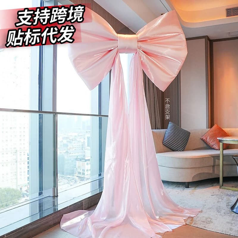 Window display decoration giant oversized red velvet bow engagement wedding room shopping mall background wall unit door layout