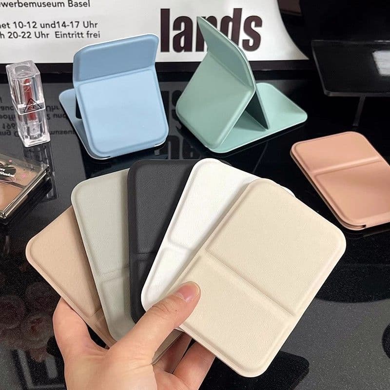 Small portable makeup mirror, travel-friendly, handheld, student dormitory mini desktop dressing mirror.