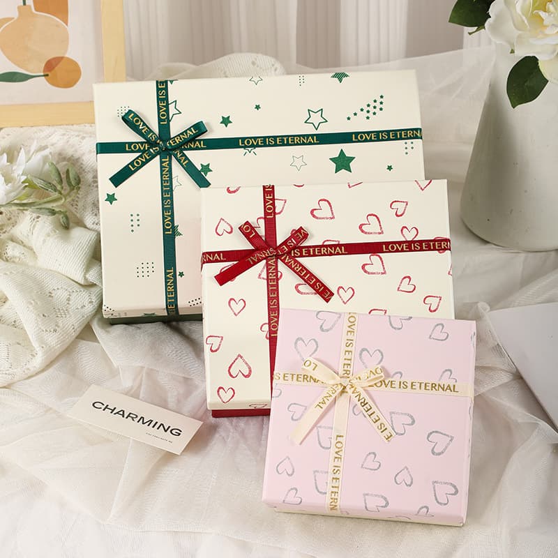 Popular Valentine's Day gift packaging boxes with bows, top and bottom lids, perfect for gifting to your girlfriend (empty boxes available wholesale).