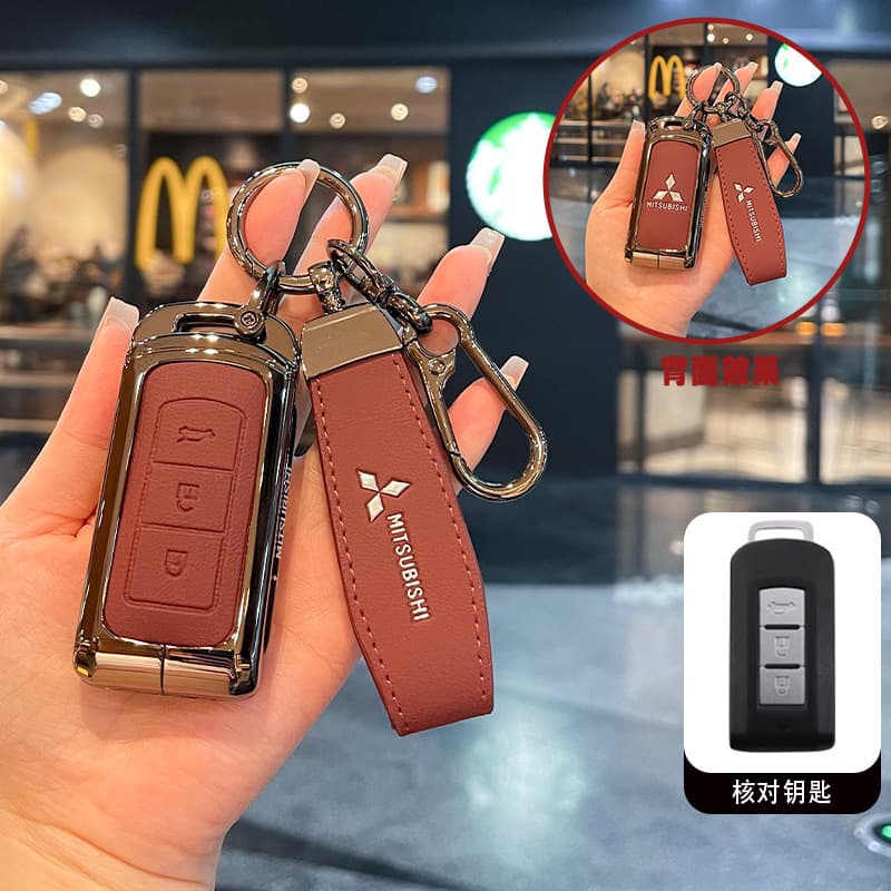 Suitable for Mitsubishi Outlander key cover Jinxuan ASX Yige L200 Pajero Jinchang XFC car bag buckle shell men