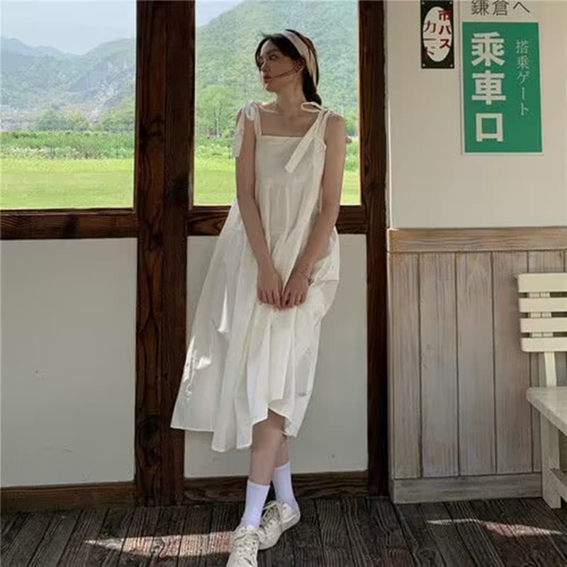 White suspender skirt summer 2023 new style small fresh bow tie mid-length first love skirt dress for women