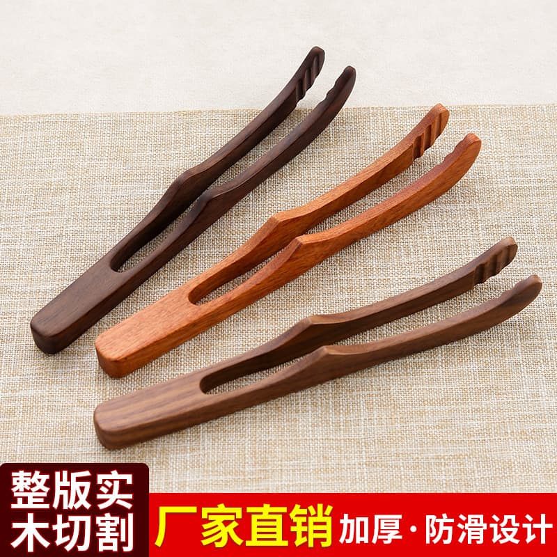 Ebony, walnut, or rosewood bent tea tongs for Gongfu tea cups, integral to the tea ceremony six essentials and cup cleaning.