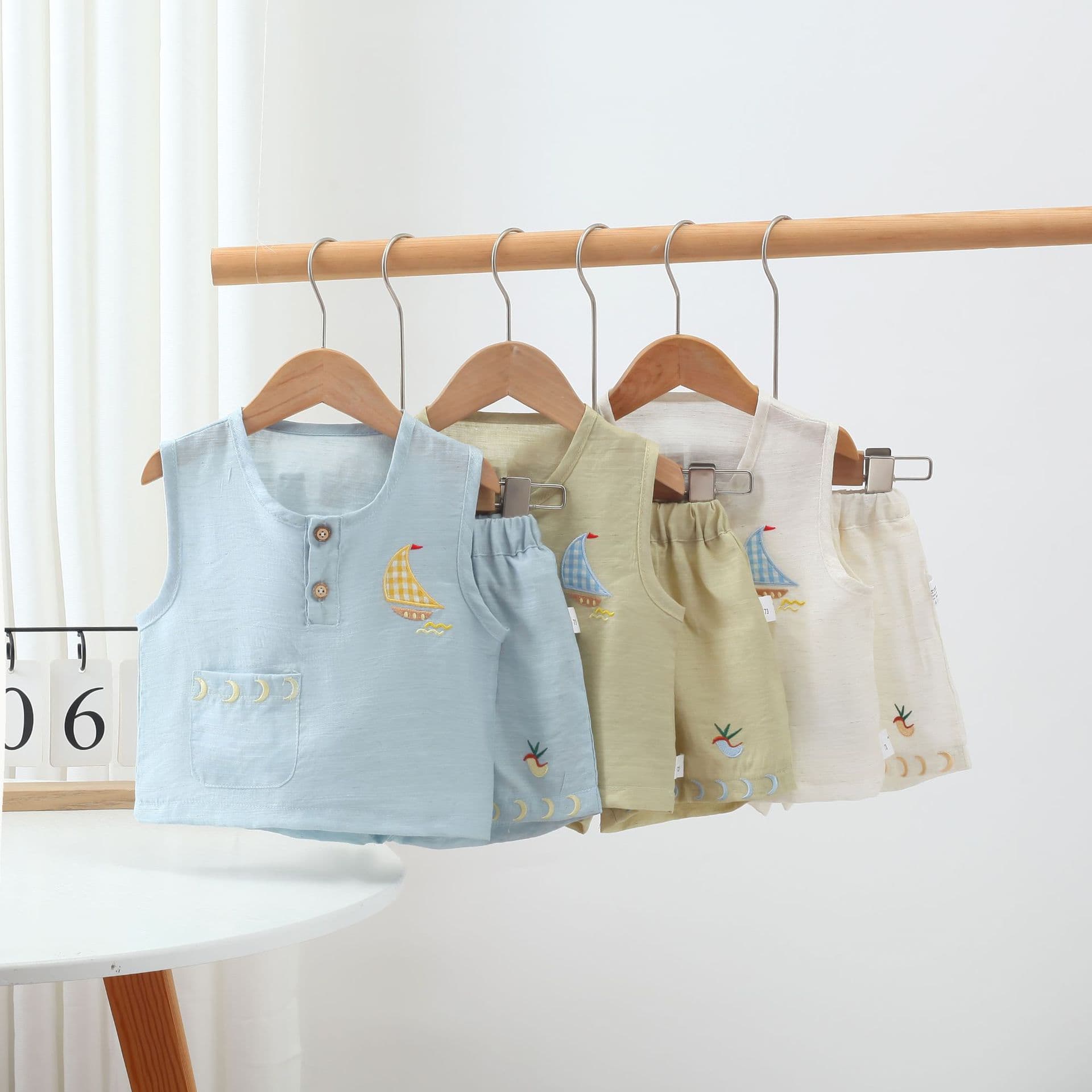 Boys summer new wide-shoulder casual suit boy baby cartoon cute sleeveless half-front vest shorts two-piece set