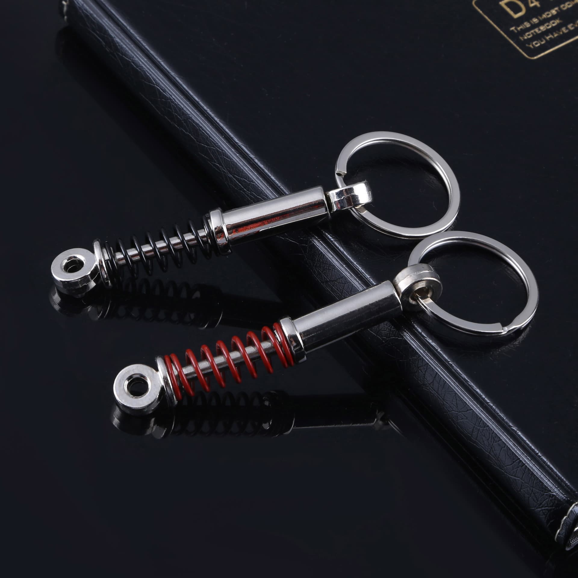 Auto parts modified metal keychain creative personalized car pendant LOGO wholesale practical creative keychain