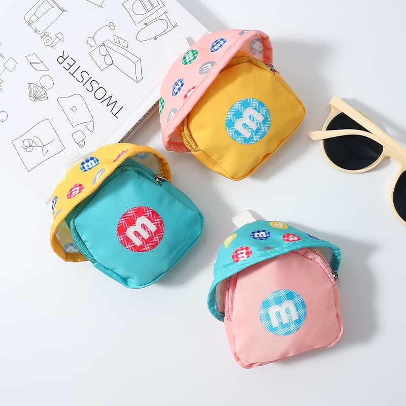 Mini backpack with short lanyard, cartoon coin purse, portable earphone bag, mini bag, keychain, wallet, card holder all in one.