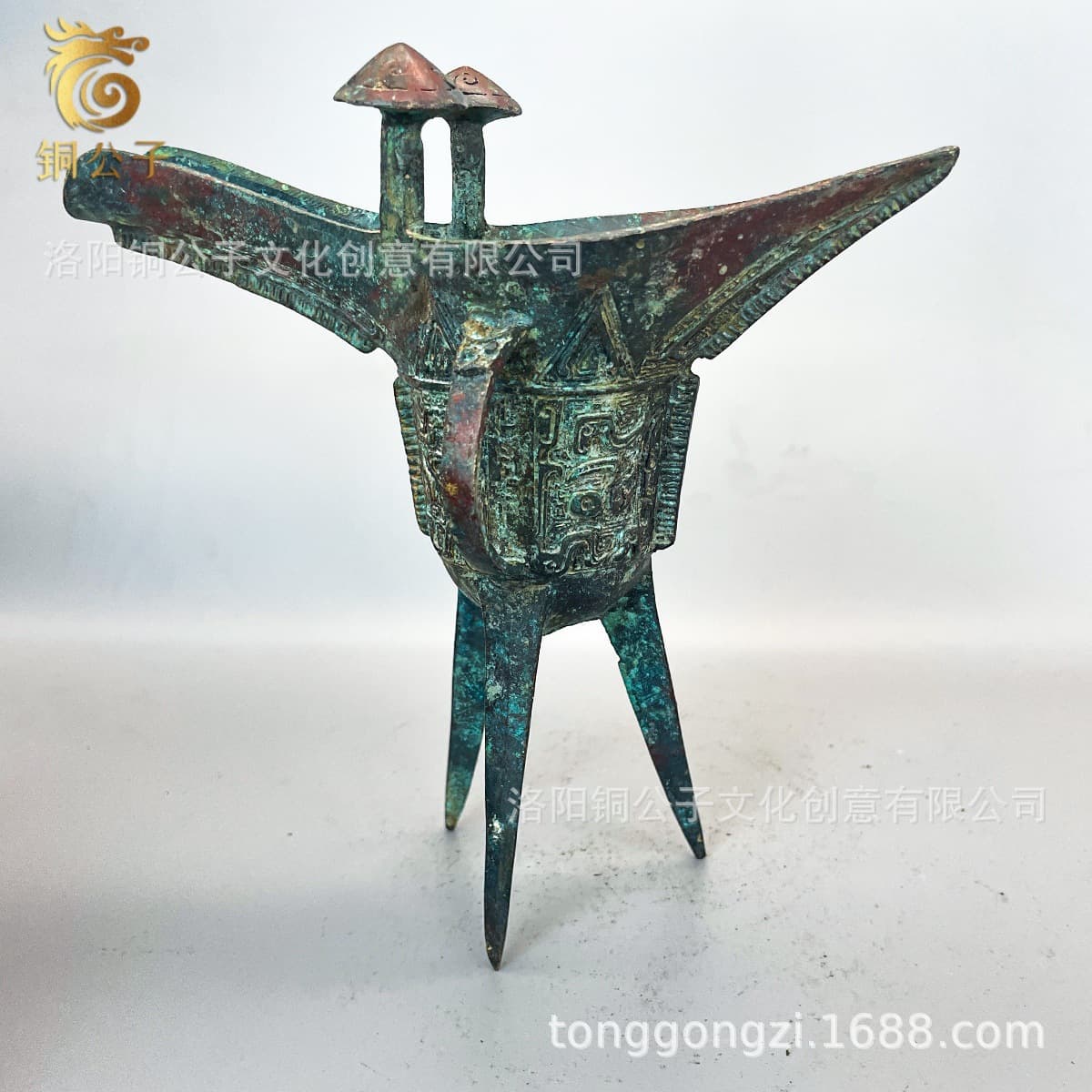 Leiwenjue antique bronze artifacts, ancient wine vessels with red spots and green patina, high-quality replicas, wholesale and retail.