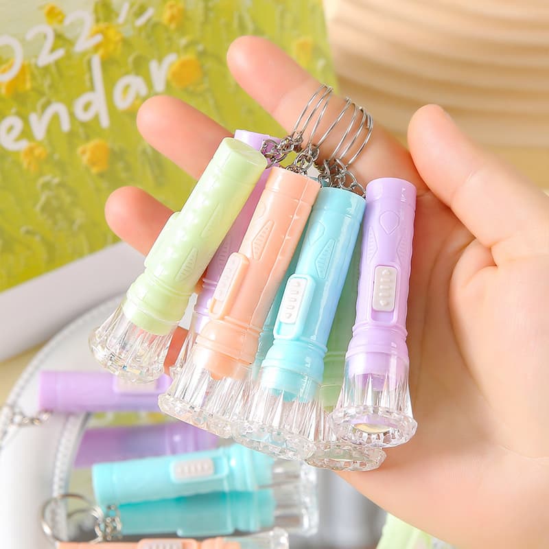 Children's small flashlight mini candy-colored flashlight, student dormitory glowing lighting toy, kindergarten small gift
