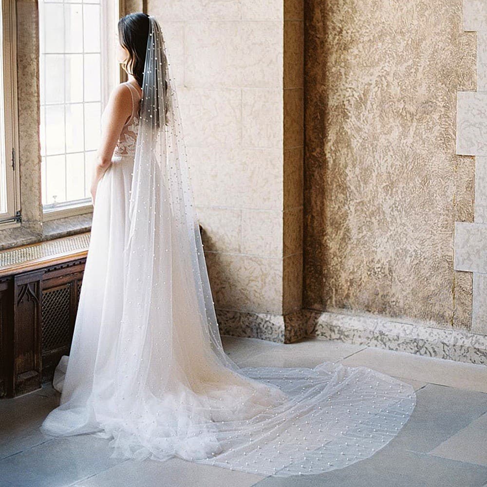Factory wholesale long single-layer pearl train veils, bridal wedding veils, and accessories for short photo studios.