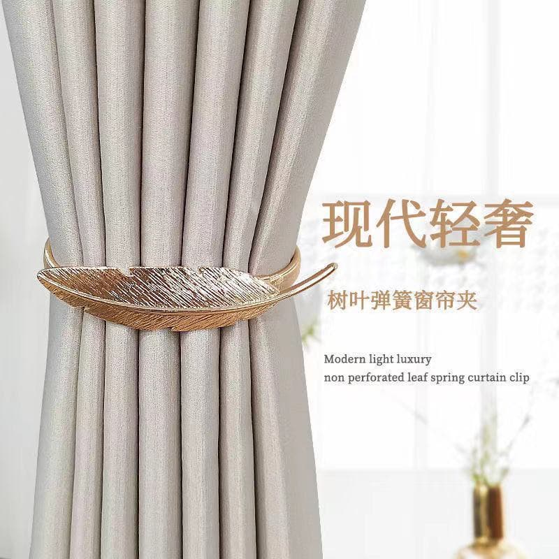 Modern minimalist luxury metal spring and metal buckle curtain tiebacks; simple curtain ball tiebacks DIY accessories.