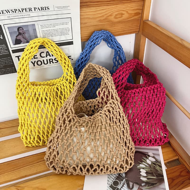 Korean-style hollow mesh handbag, handwoven cotton rope wrist bag, fashionable and versatile bucket bag for women for beach vacation