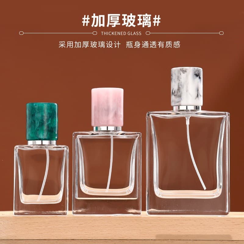 Wholesale flat square perfume bottle press spray bottle square packaging empty bottle transparent glass cosmetic repackaging empty bottle
