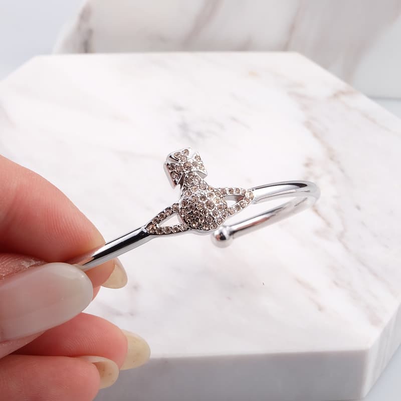 Vivienne Westwood Saturn Collection Silver Champagne Diamond Sparkling Saturn Logo Bracelet