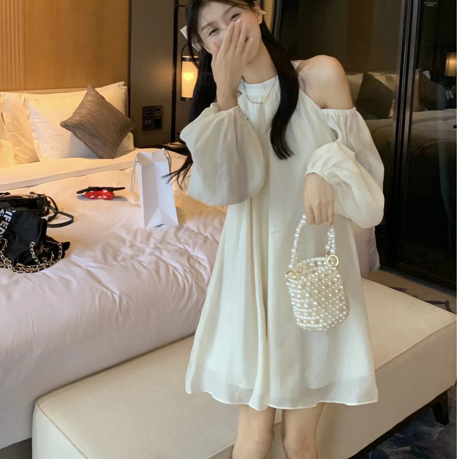 White French off-shoulder halterneck dress for women 2025 new lantern sleeves loose design long-sleeved short skirt