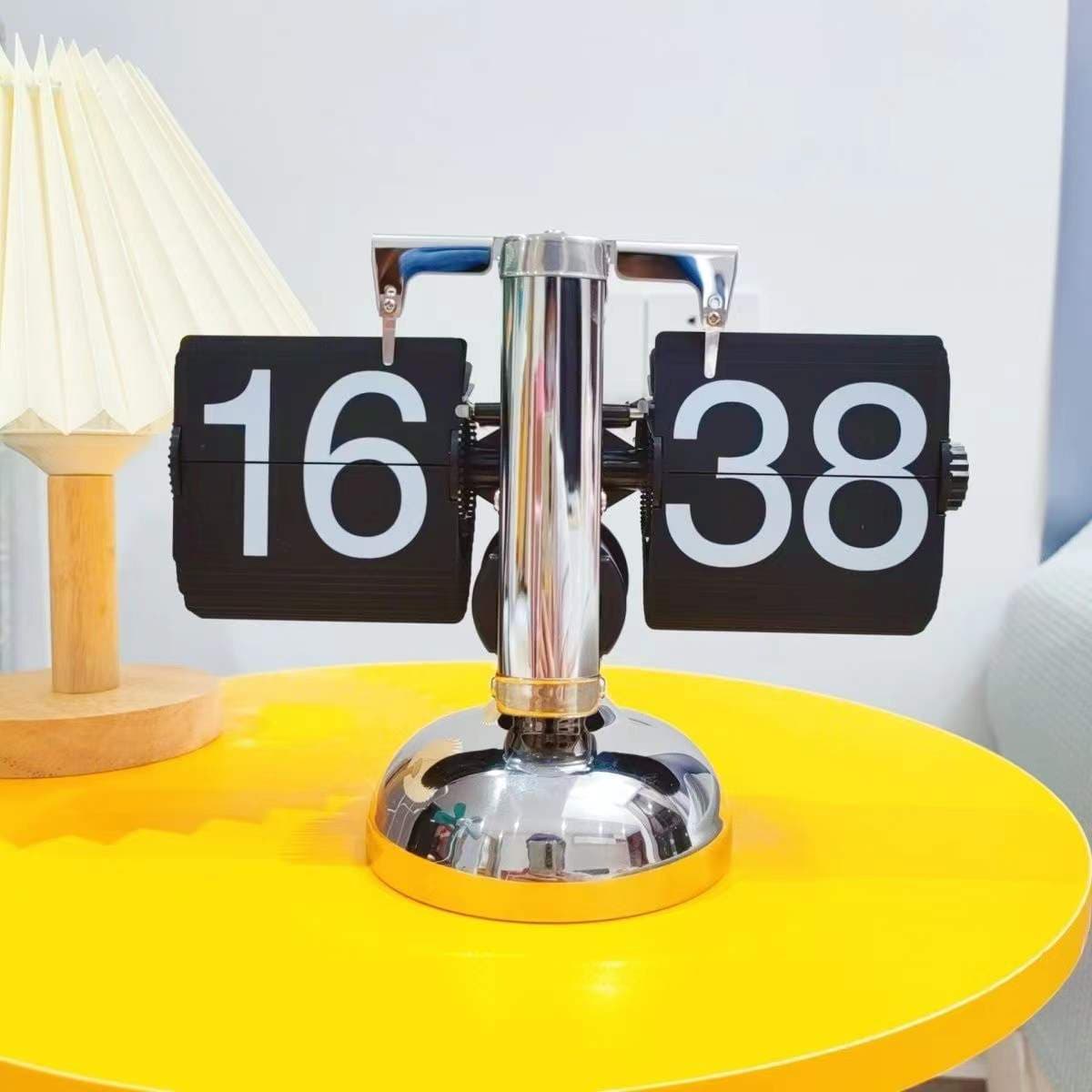 Creative automatic flip clock, retro living room ornament, modern minimalist engraved table clock, single-leg small balance clock.