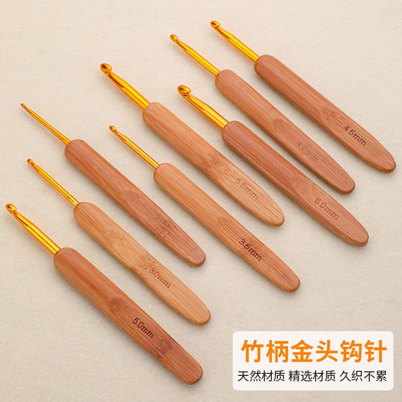 Cross-border Crochet Hook hot-selling crochet hook 2.5-6.0mm carbonized bamboo handle gold head crochet hook handmade sweater needle