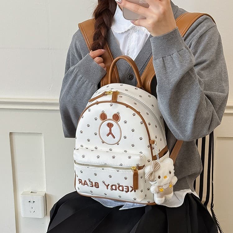 Gentle wind mini backpack with puppy paws printed all over, Korean style outfit for girls to visit the store in summer and travel small backpack