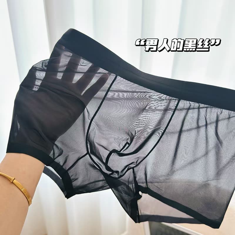 Hot Selling Men's Ice Silk Underwear Seamless Transparent Sexy Lightweight Invisible Boxer Briefs Summer Four-Corner Shorts